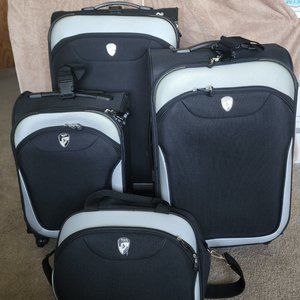 Black 4-Piece Heys Luggage - Used